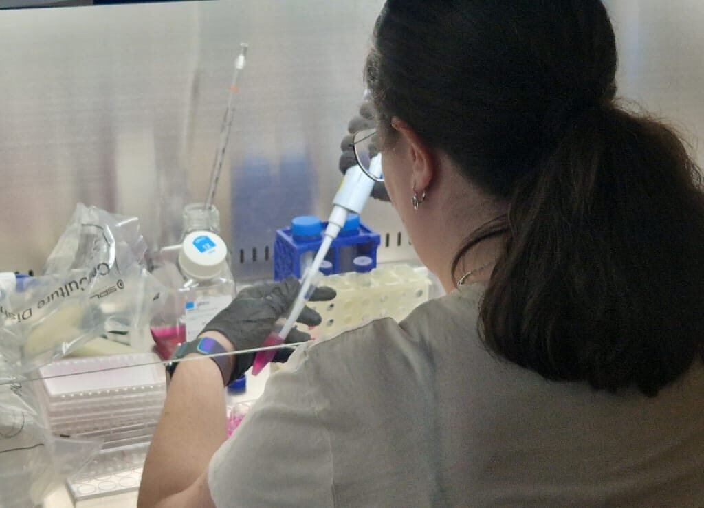 Student learning compounding pharmacy techniques during an internship in Greece.